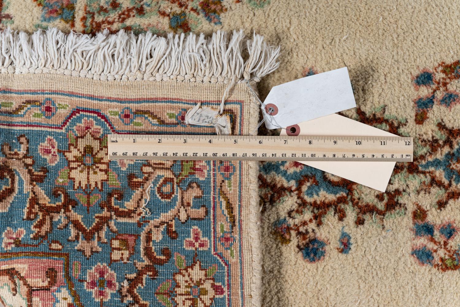 A Kirman Wool Rug