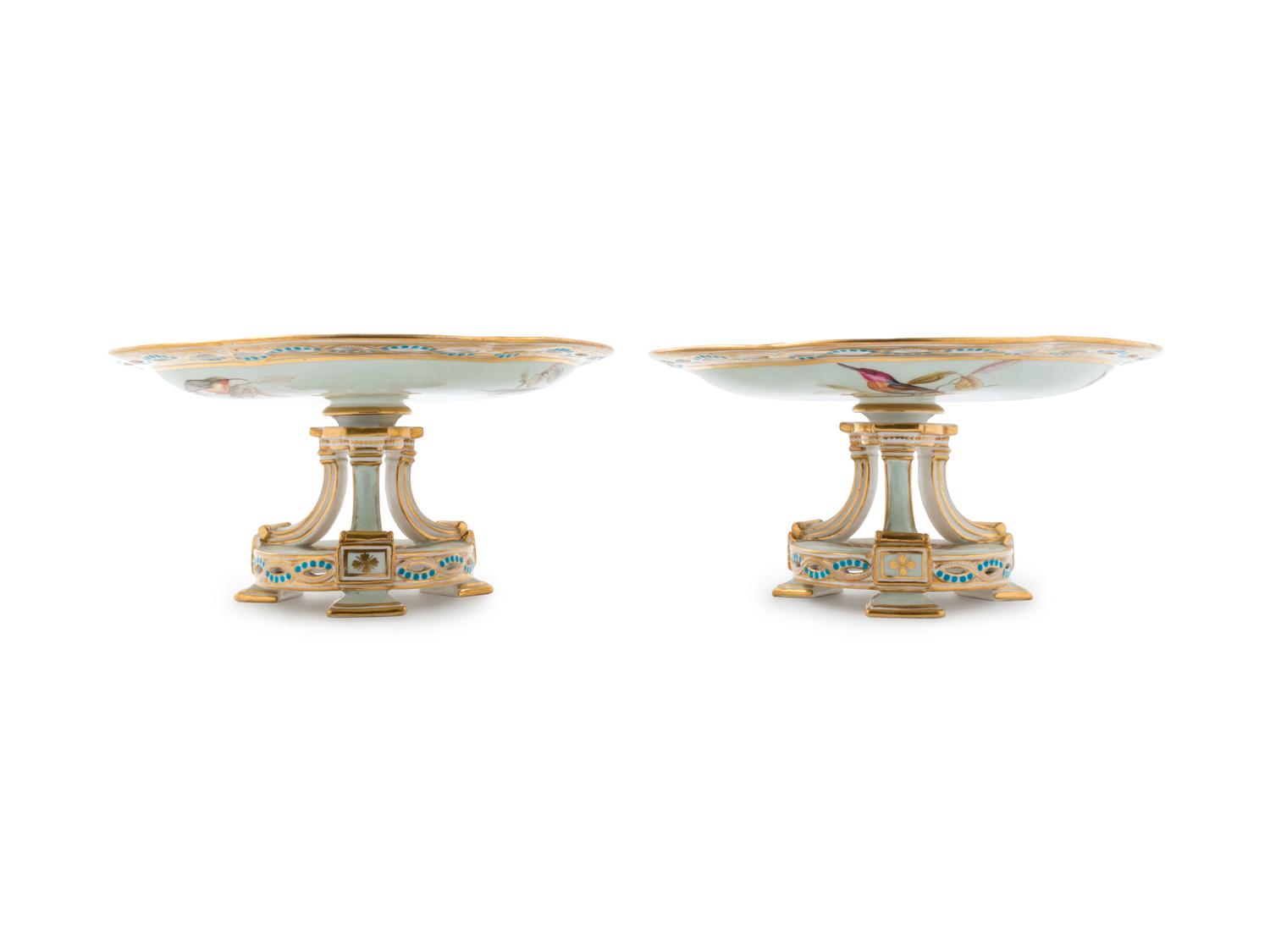 A Pair of Continental Ornithological Painted and Parcel Gilt Porcelain Compotes
