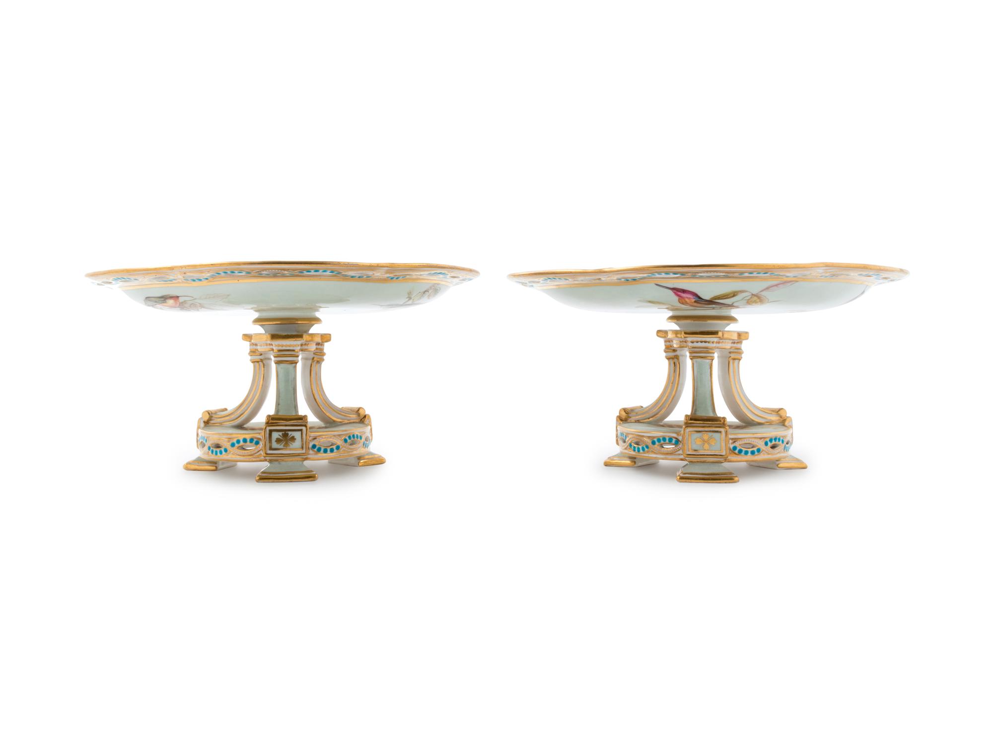 A Pair of Continental Ornithological Painted and Parcel Gilt Porcelain Compotes