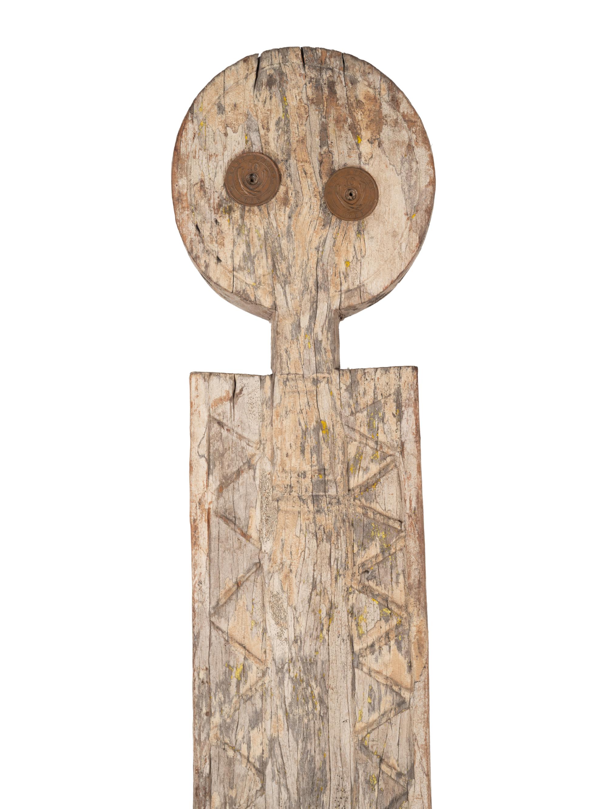 A Group of Three Carved Commemorative Posts