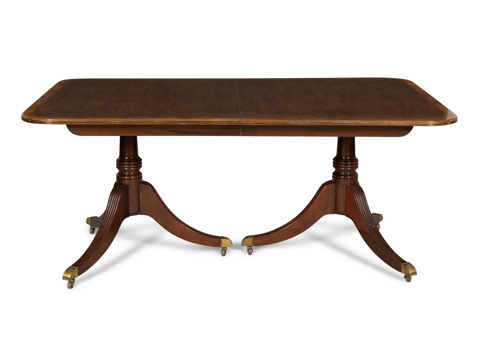 A George III Style Double-Pedestal Mahogany Dining Table