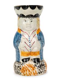 A Miniature Yorkshire Style Toby Jug and Two Miniature Toby Jug-Form Articles
