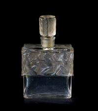 A Lalique Molded and Frosted Glass Perfume Bottle, for Molinard, Height 4 1/4 inches.