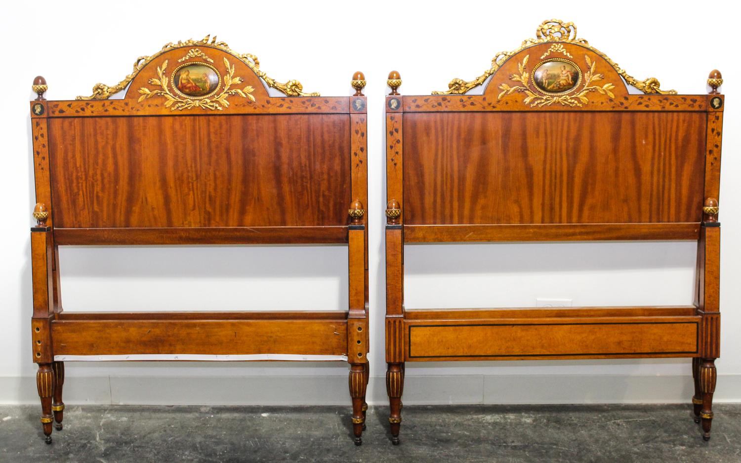 A Pair of Italian Painted and Parcel Gilt Walnut Twin Beds Height 49 x width 39 1/2 x depth 82 inches. — EARLY 20TH CENTURY