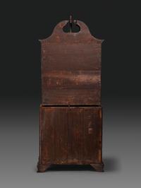 A Chippendale Figured Mahogany Bonnet Top Desk-and-Bookcase