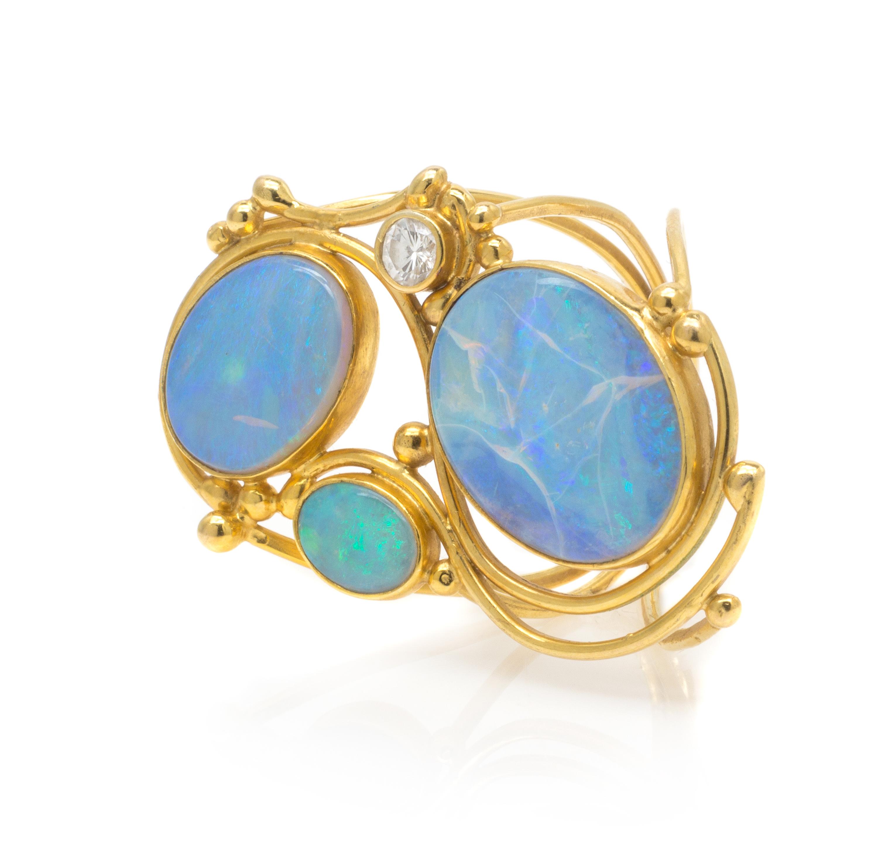 A Collection of Yellow Gold, Opal and Diamond Jewelry, 49.60 dwts.