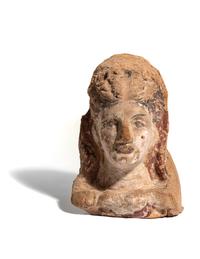 A Greek Terra Cotta Antefix