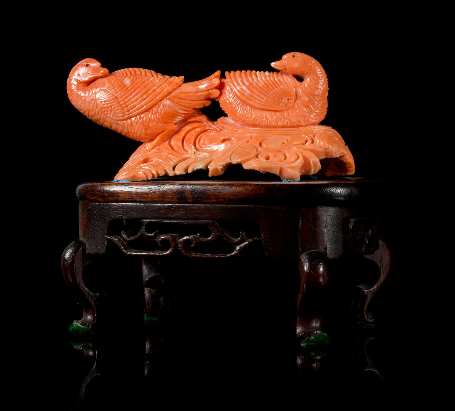 A Carved Coral Figural Group Height 1 3/4 x 4 1/2 inches without stand