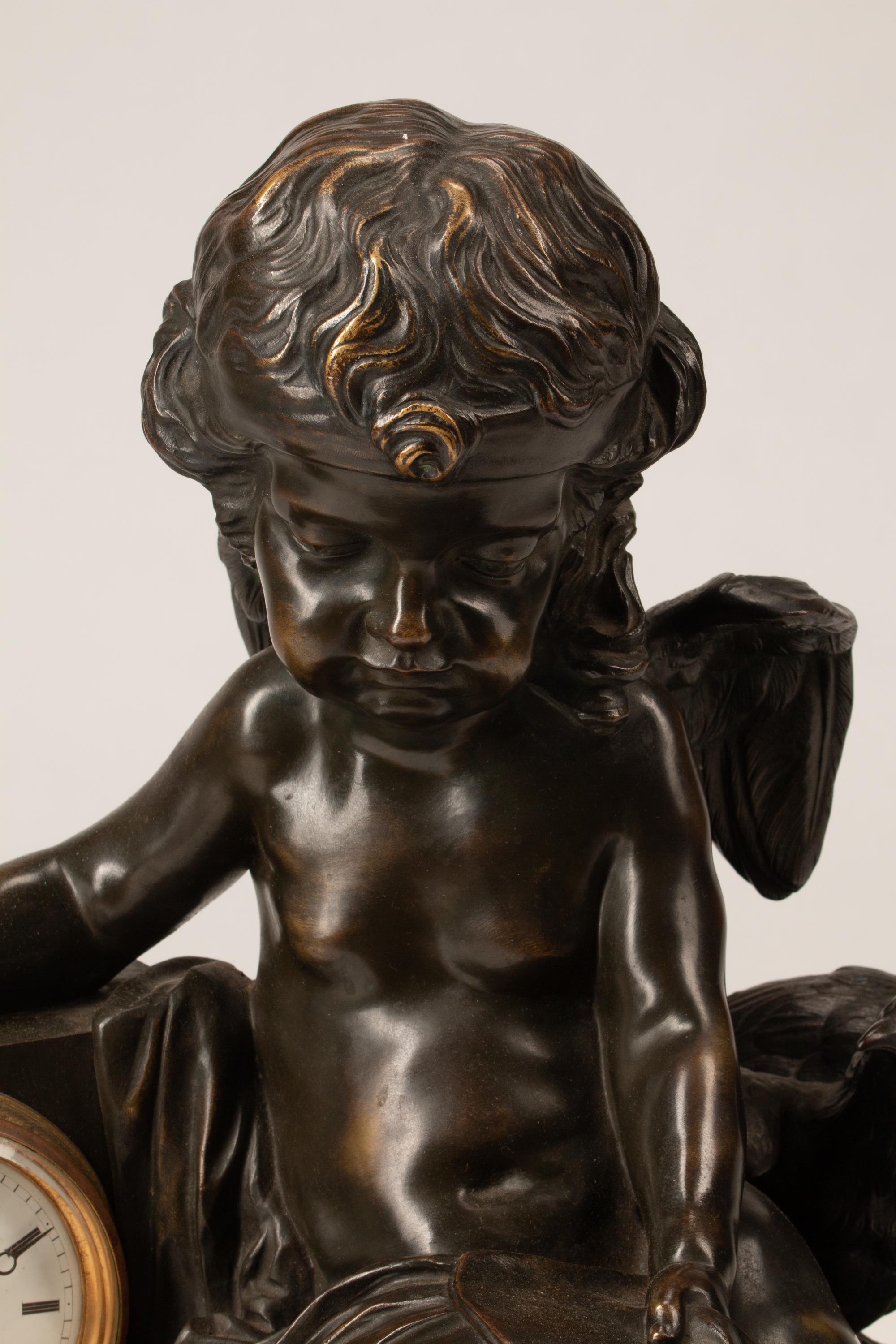 A Louis XVI Style Patinated Bronze Mantel Clock — 19TH CENTURY