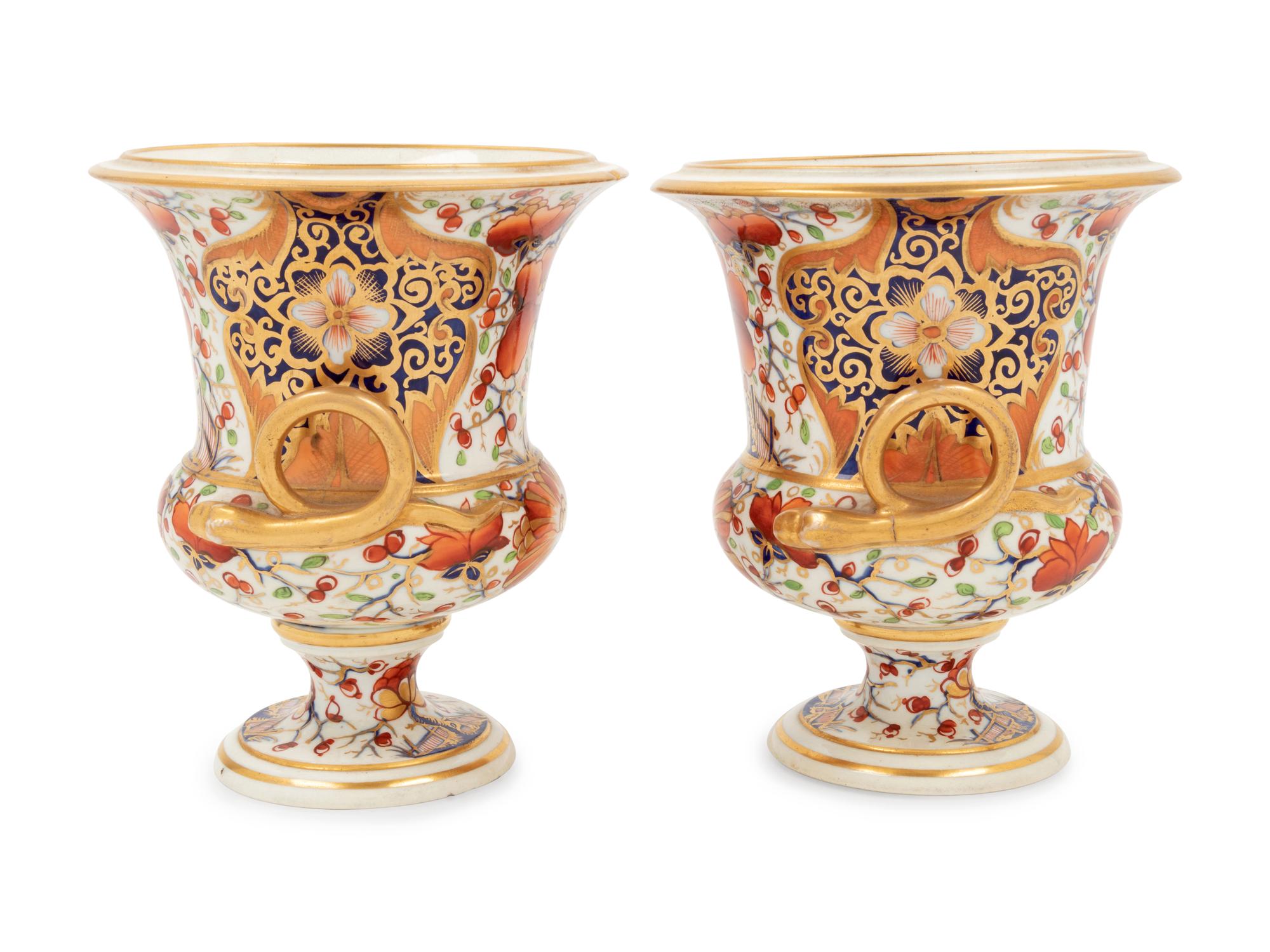 A Pair of Derby Porcelain Urns