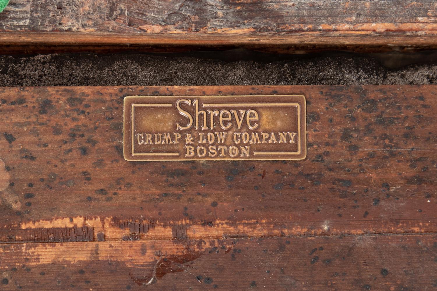 A Chippendale Parcel Gilt and Carved Mahogany Looking Glass