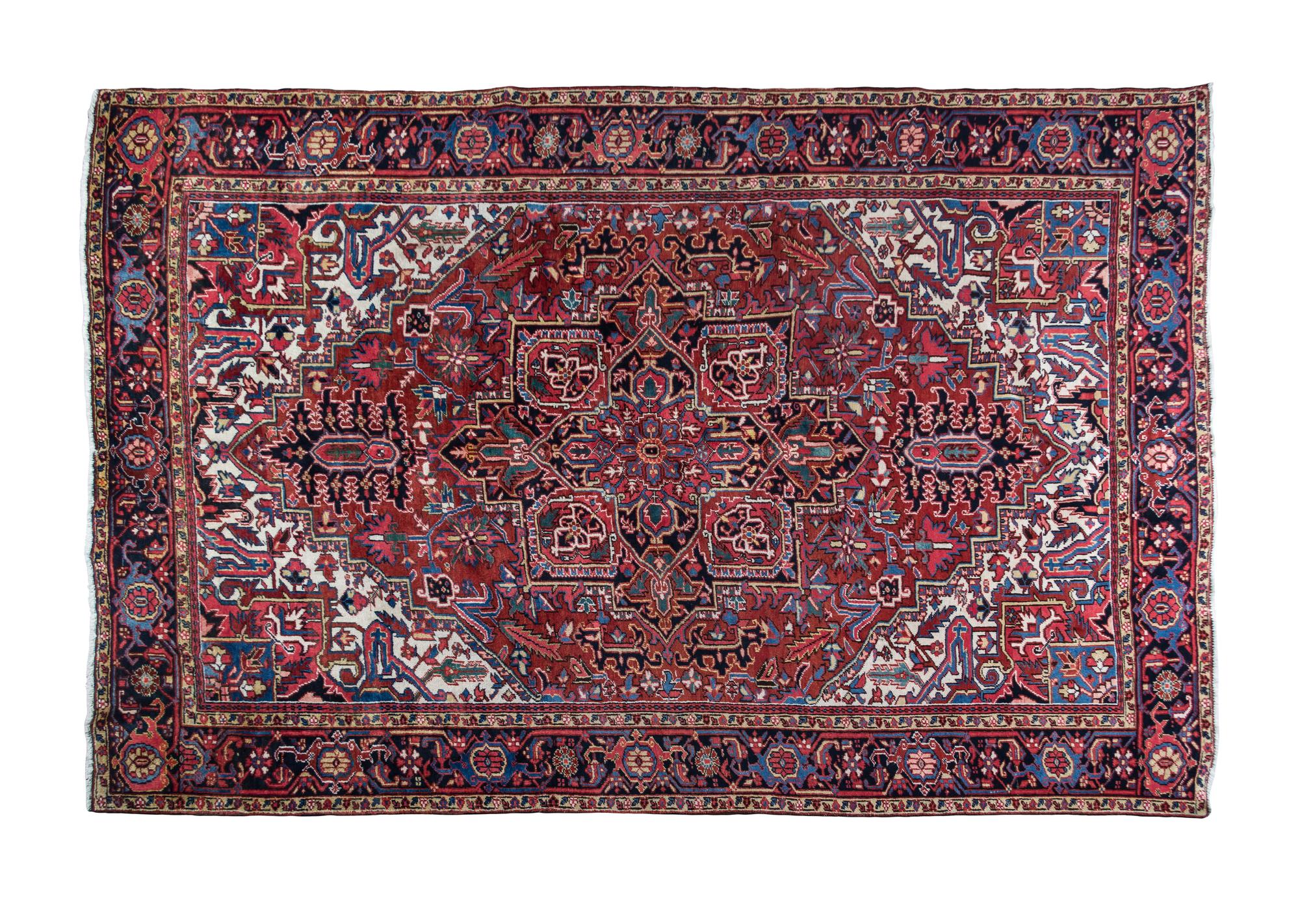 A Sarouk Wool Rug 10 feet 11 inches x 7 feet 7 inches.