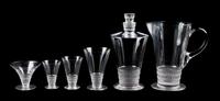 A Set of Lalique Stemware Height of first 9 1/2 inches.