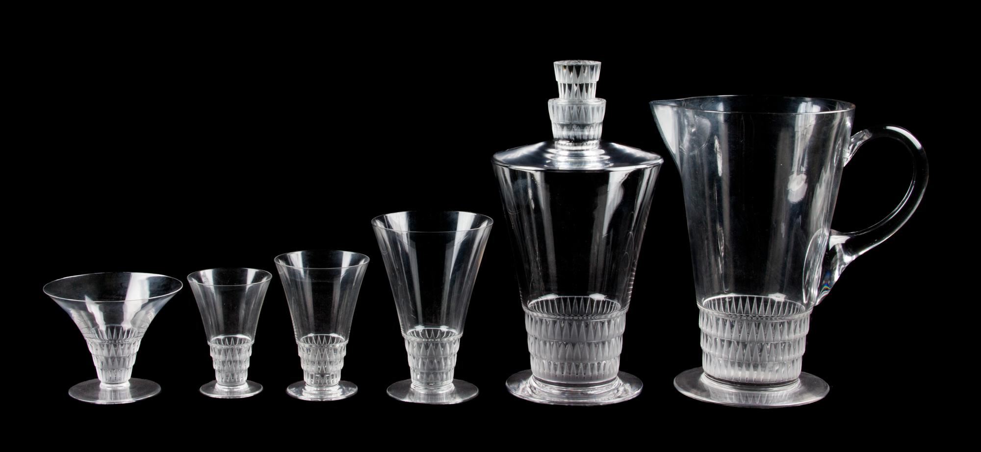 A Set of Lalique Stemware Height of first 9 1/2 inches.