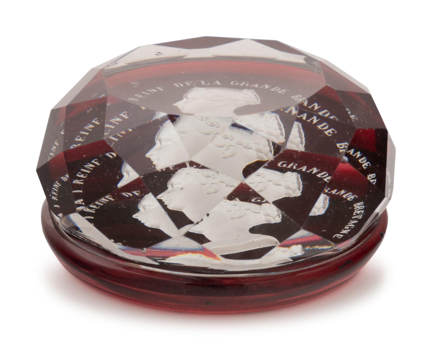 A Baccarat Queen Victoria Sulfide on Ruby Ground Faceted Glass Paperweight