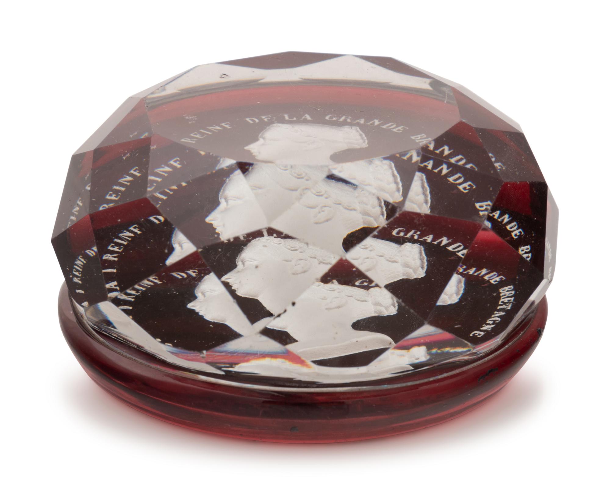 A Baccarat Queen Victoria Sulfide on Ruby Ground Faceted Glass Paperweight