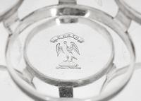 A George III Silver and Cut Glass Cruet Set