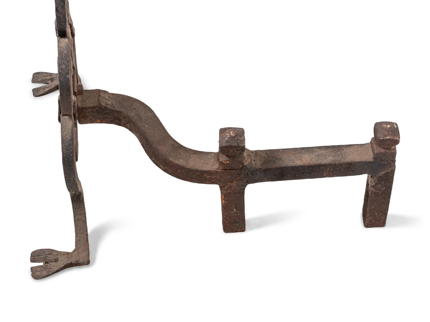 A Pair of Continental Iron Fleur-de-Lis Andirons
