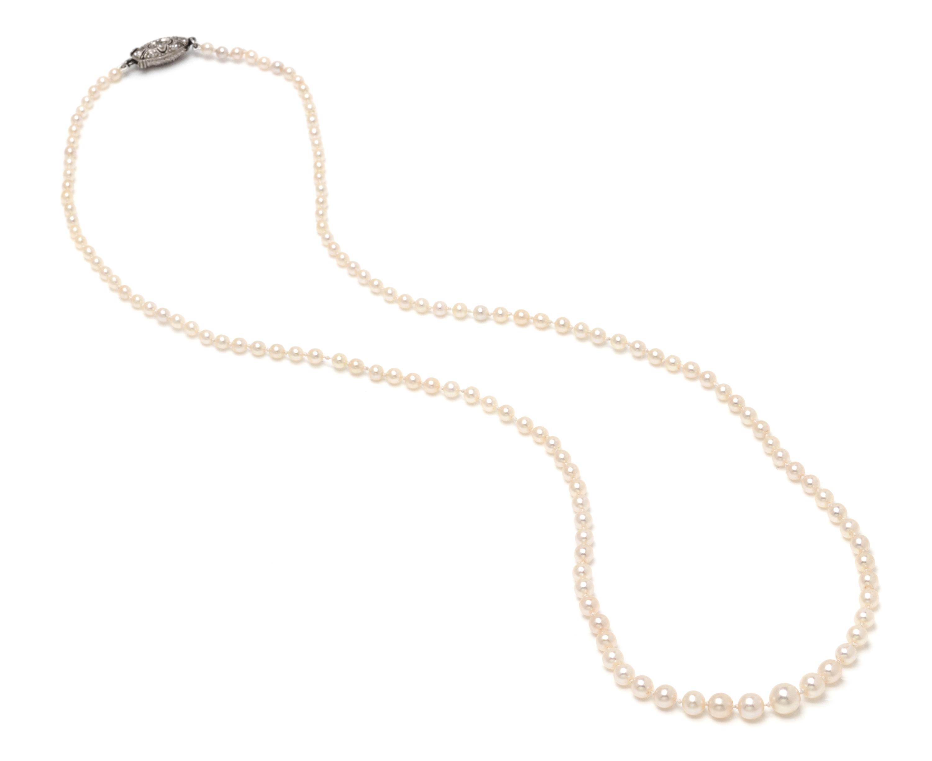 A Graduated Single Strand Natural Pearl Necklace,