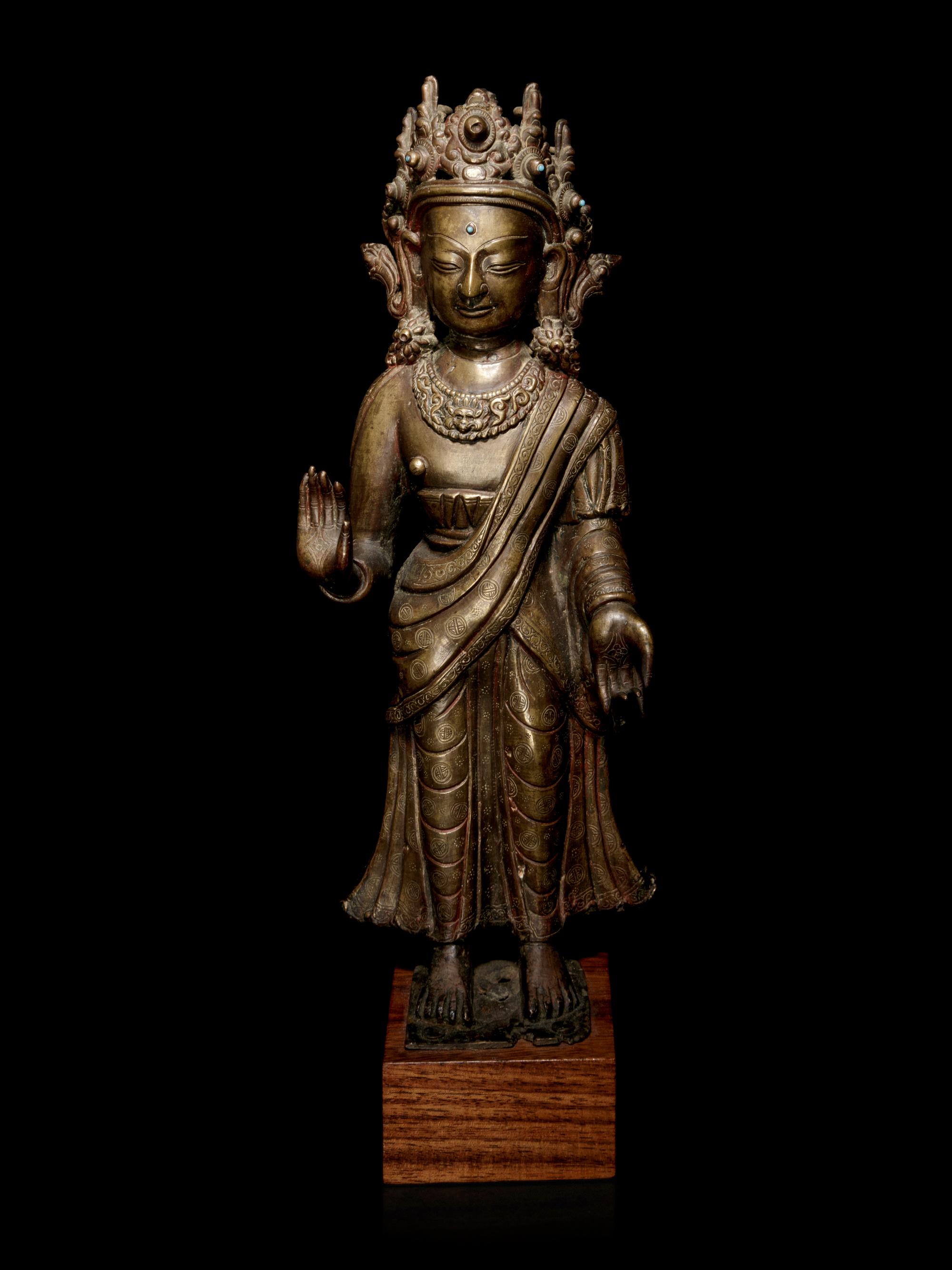 A Large Tibetan Gilt Bronze Figure of Buddha Dipankara