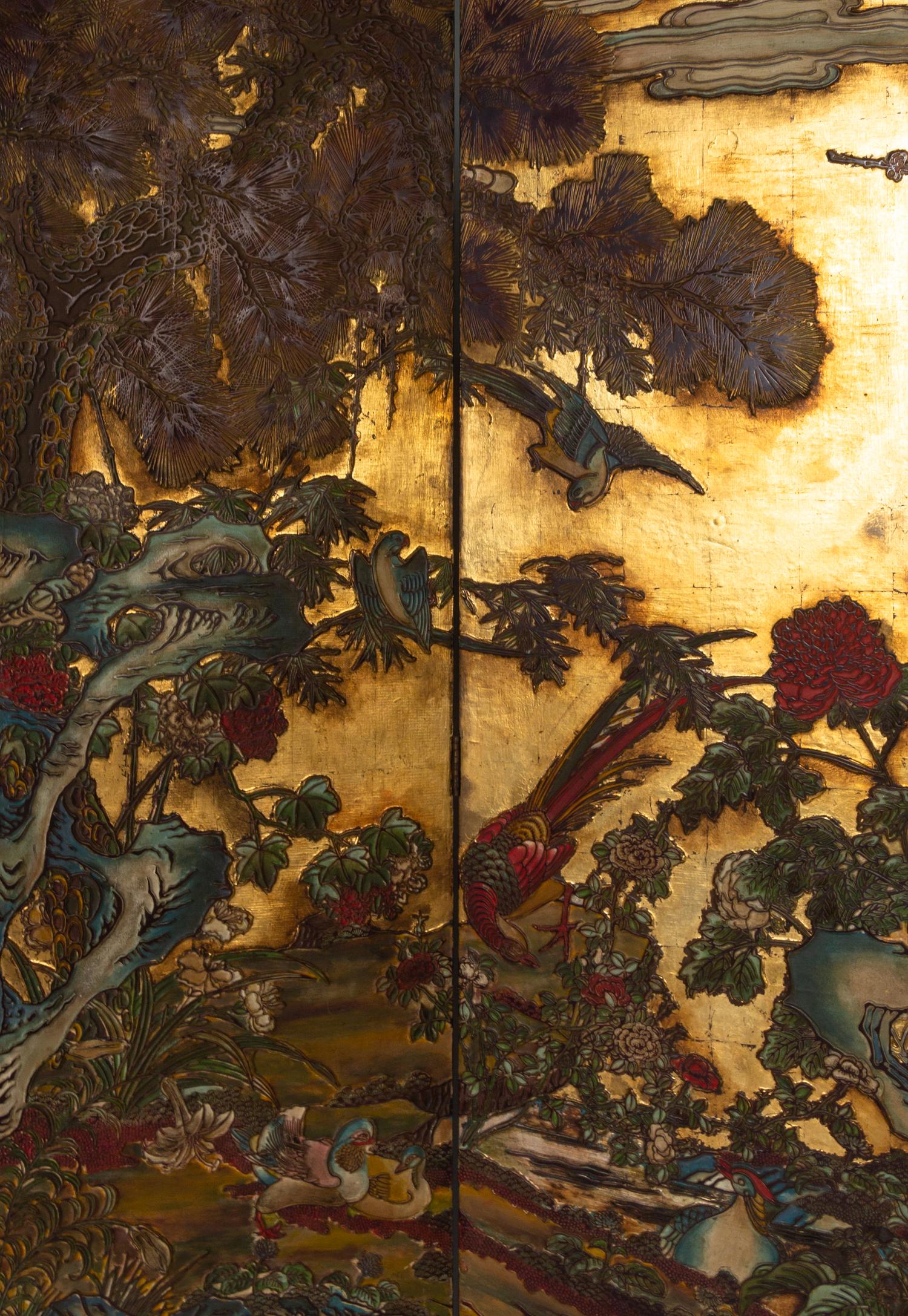 A Coromandel Lacquer Eight-Panel Floor Screen