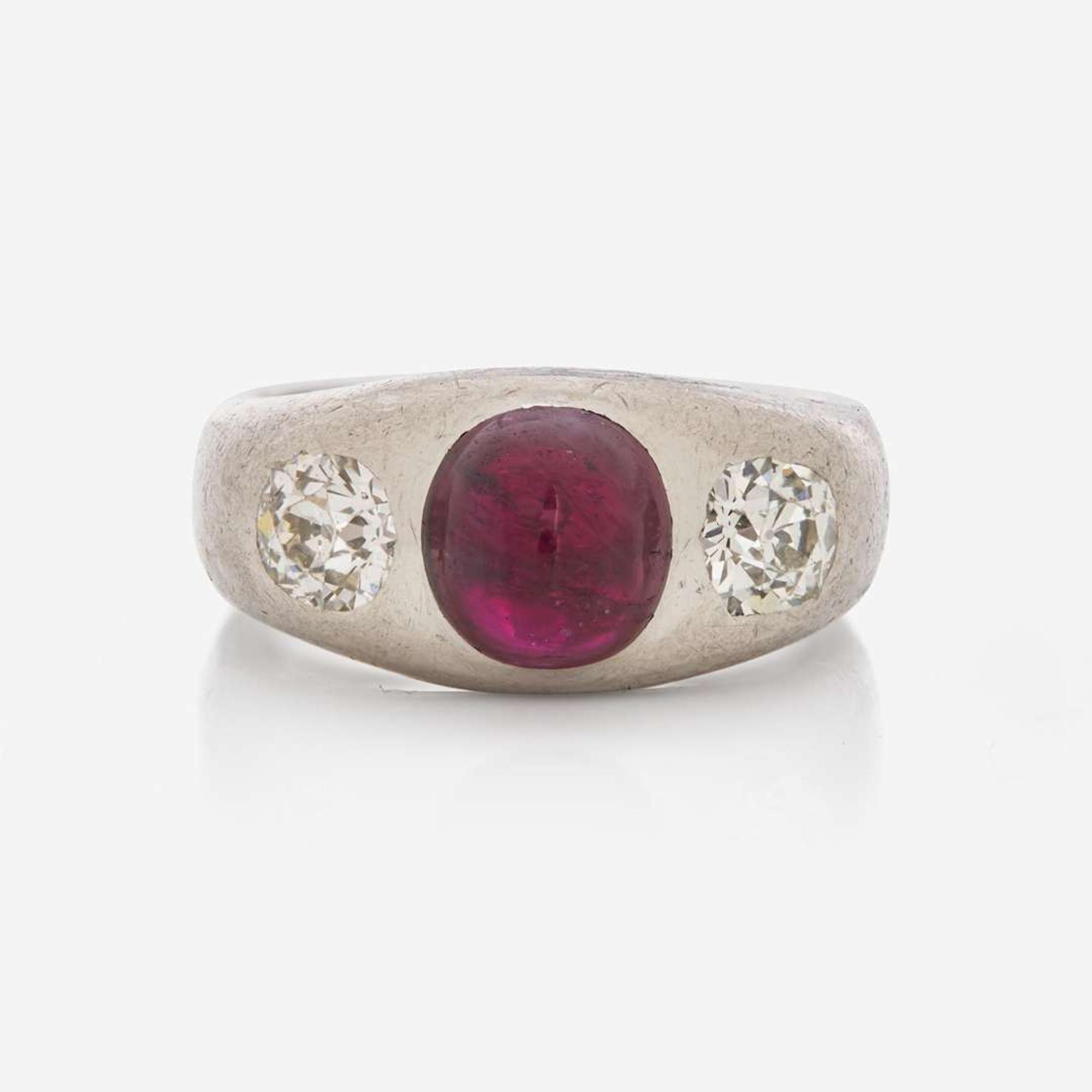 A Three-Stone Art Deco Platinum, Ruby, and Diamond Ring C.1920