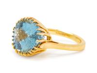 A 14 Karat Yellow Gold and Aquamarine Ring, Remue,
