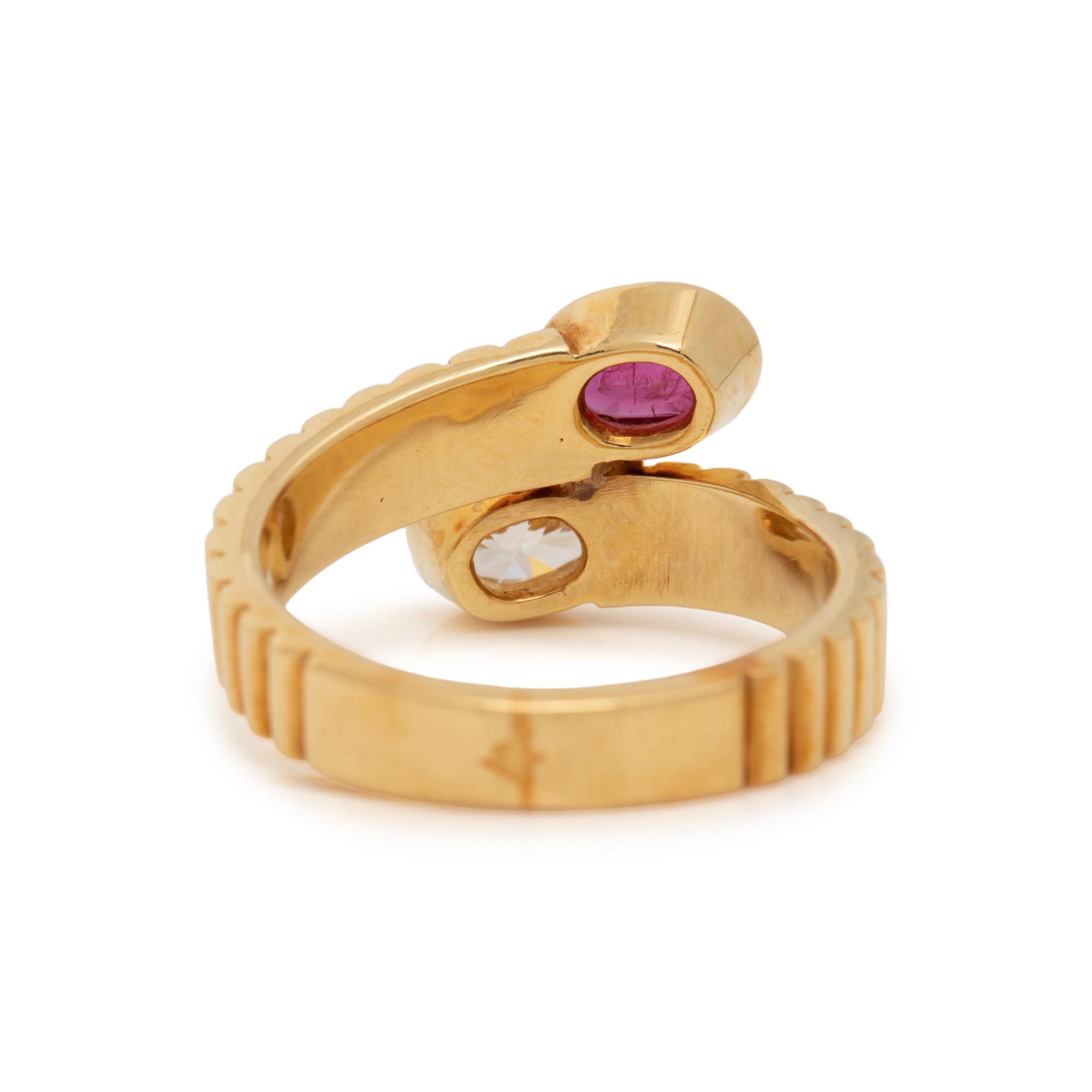 YELLOW GOLD, DIAMOND AND RUBY BYPASS RING