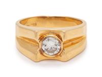 A 14 Karat Yellow Gold and Diamond Ring,