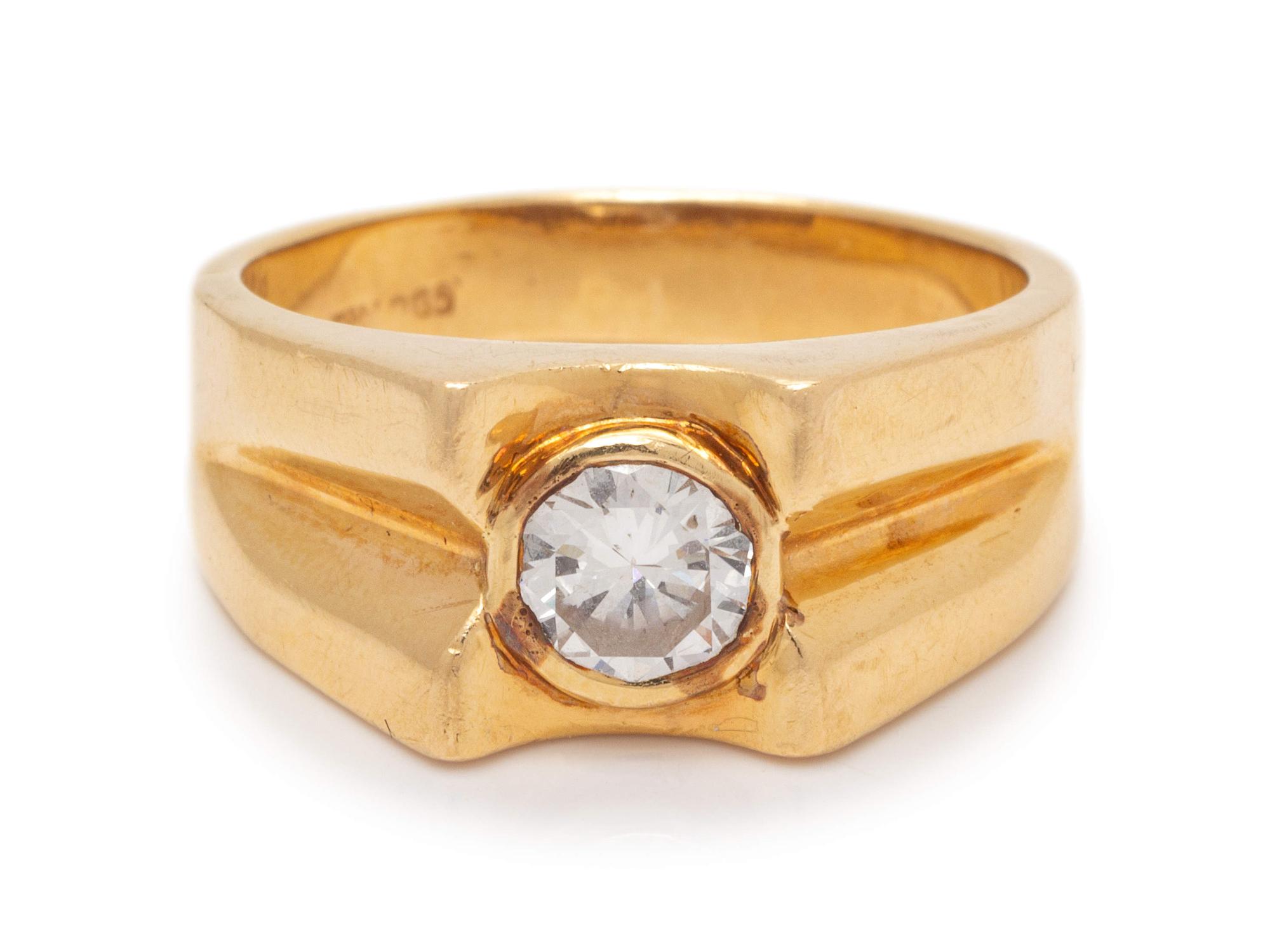 A 14 Karat Yellow Gold and Diamond Ring,