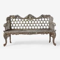 A pair of black-painted cast iron garden armchairs and bench Jacob Sobers, Philadelphia, PA, and John Mclean, New York, NY, late 19th century