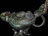 A Late Roman Bronze Lamp with Bull Head Handle and Greek Inscription