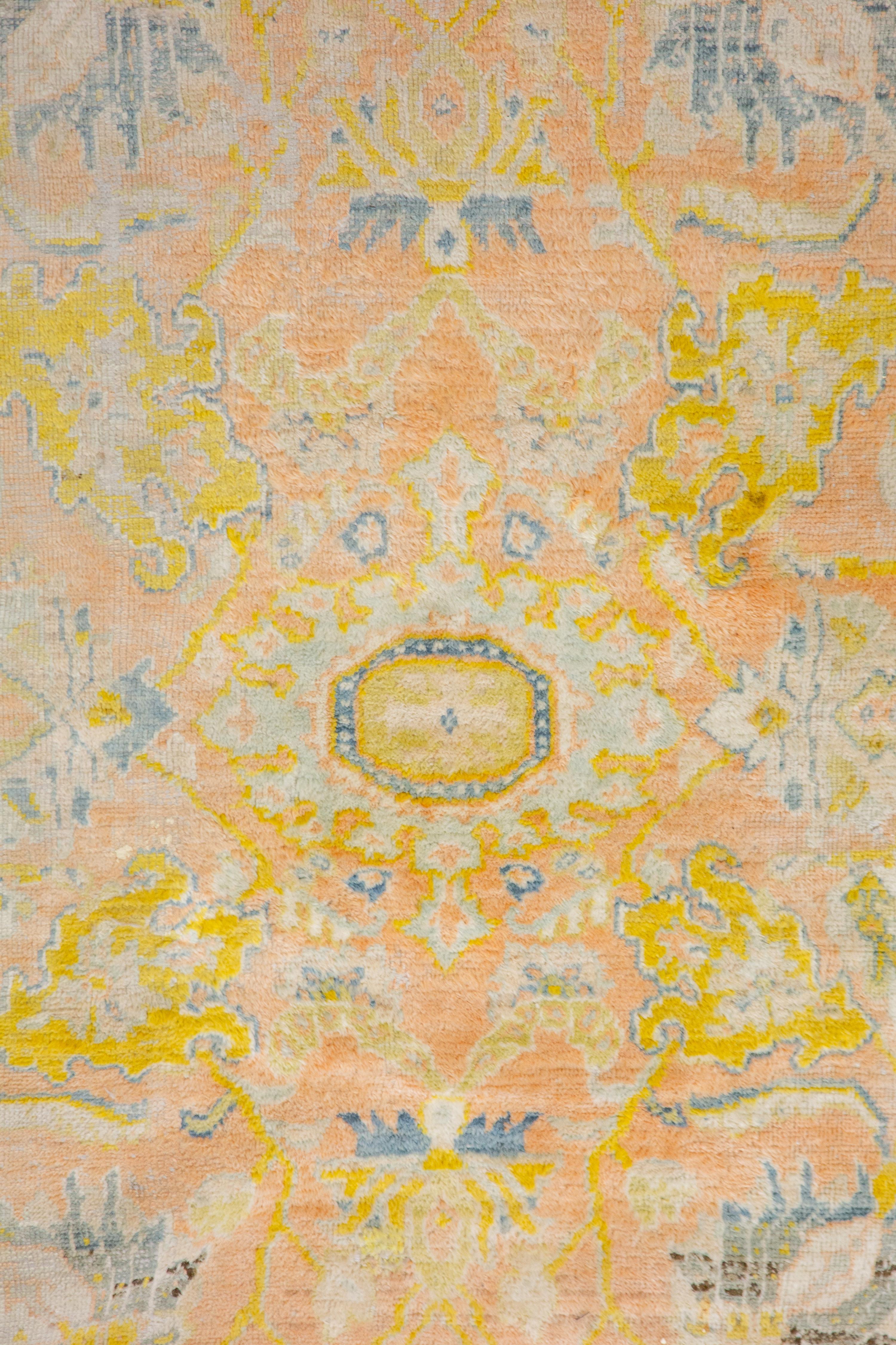An Oushak Wool Rug