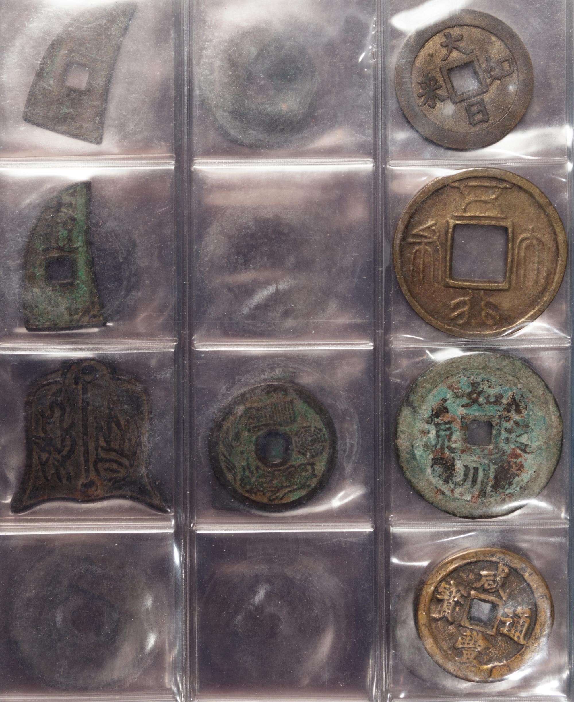 A Large Collection of Chinese Coins and Pendants