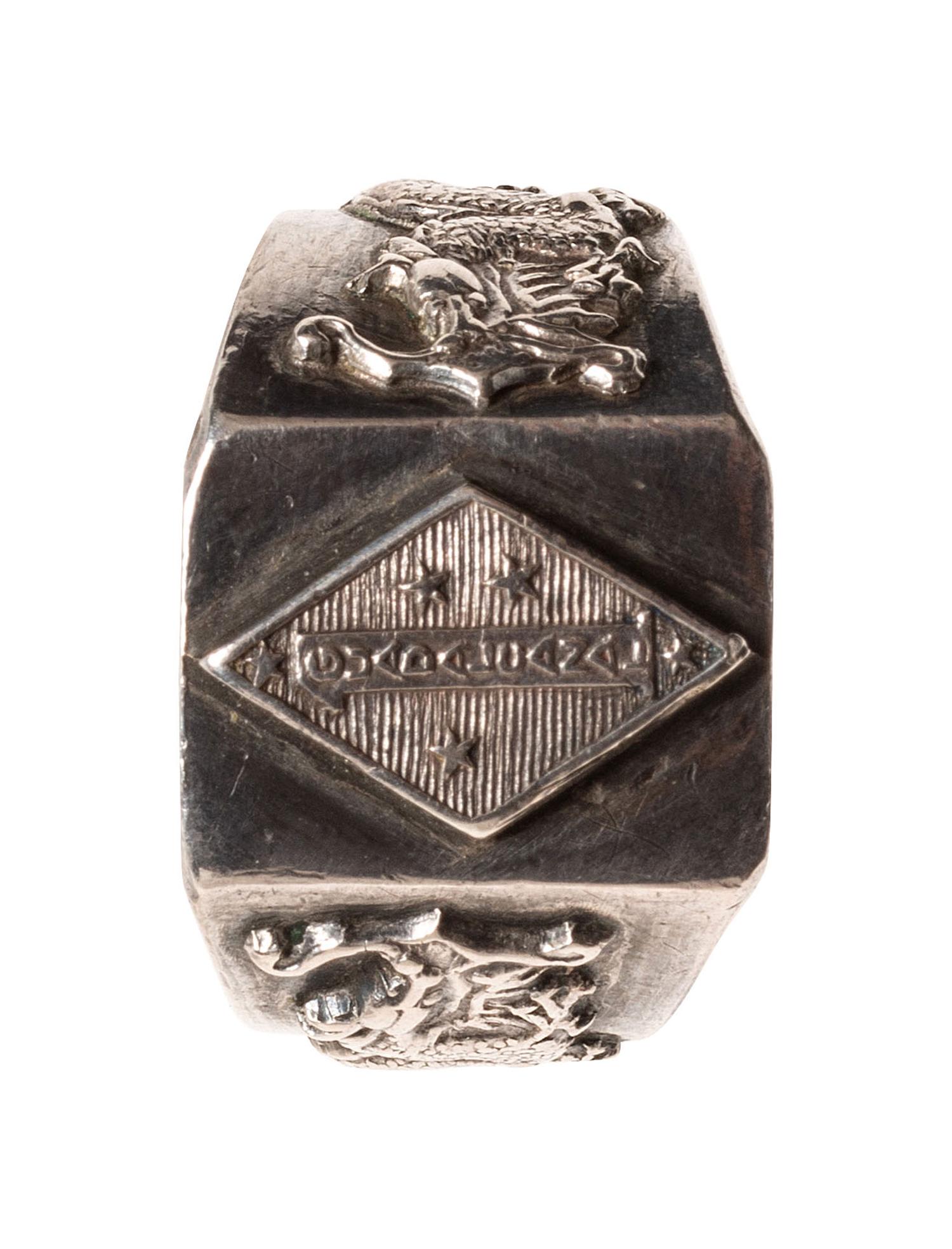 [WORLD WAR II]. A group of 5 items, incl. naval pilots' wings and dragon ring.