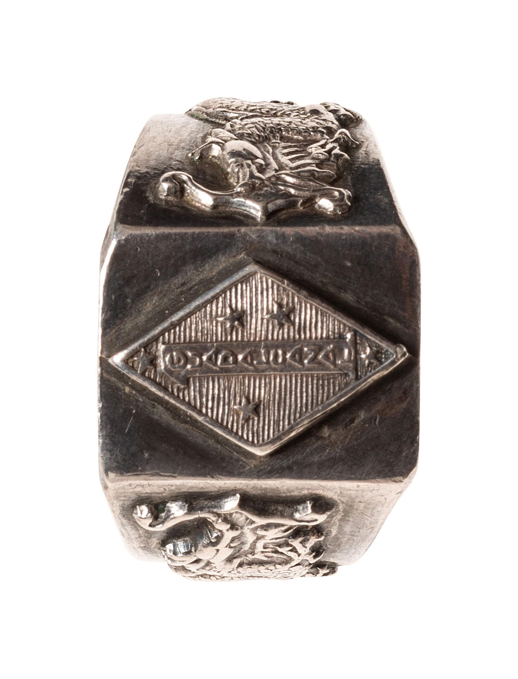 [WORLD WAR II]. A group of 5 items, incl. naval pilots' wings and dragon ring.