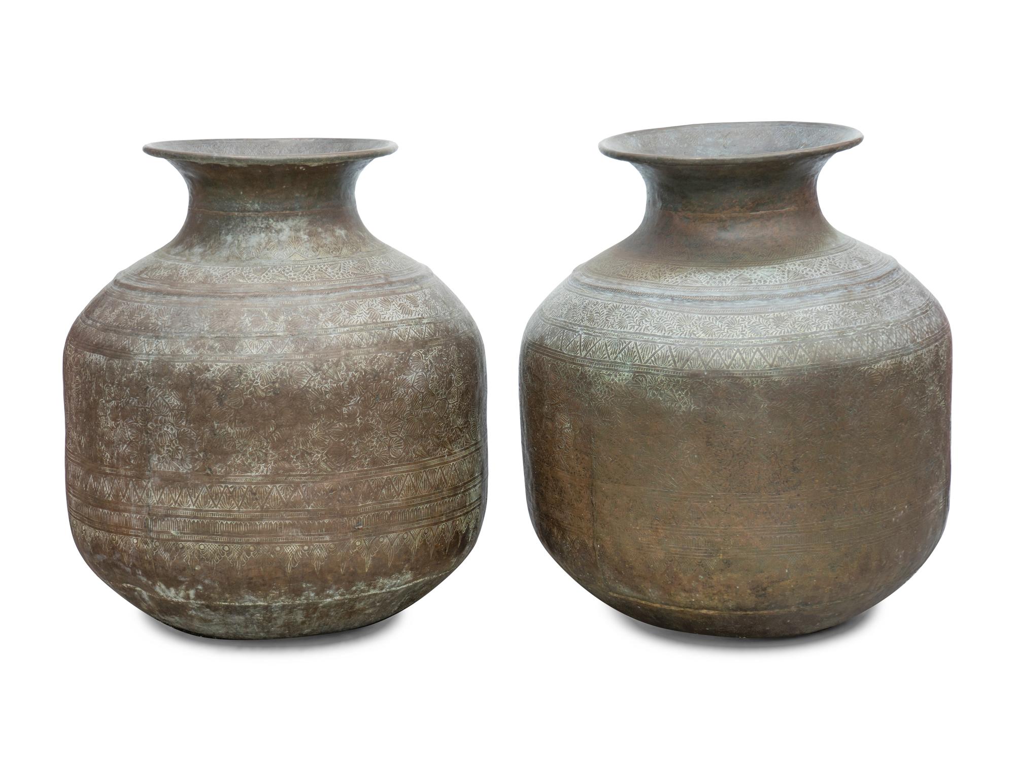 A Pair of Large Thai Hammered Metal Unrs — 20TH CENTURY