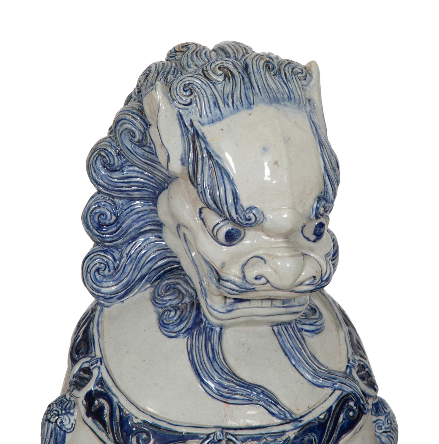 A Pair of Chinese Glazed Ceramic Guardian Lions