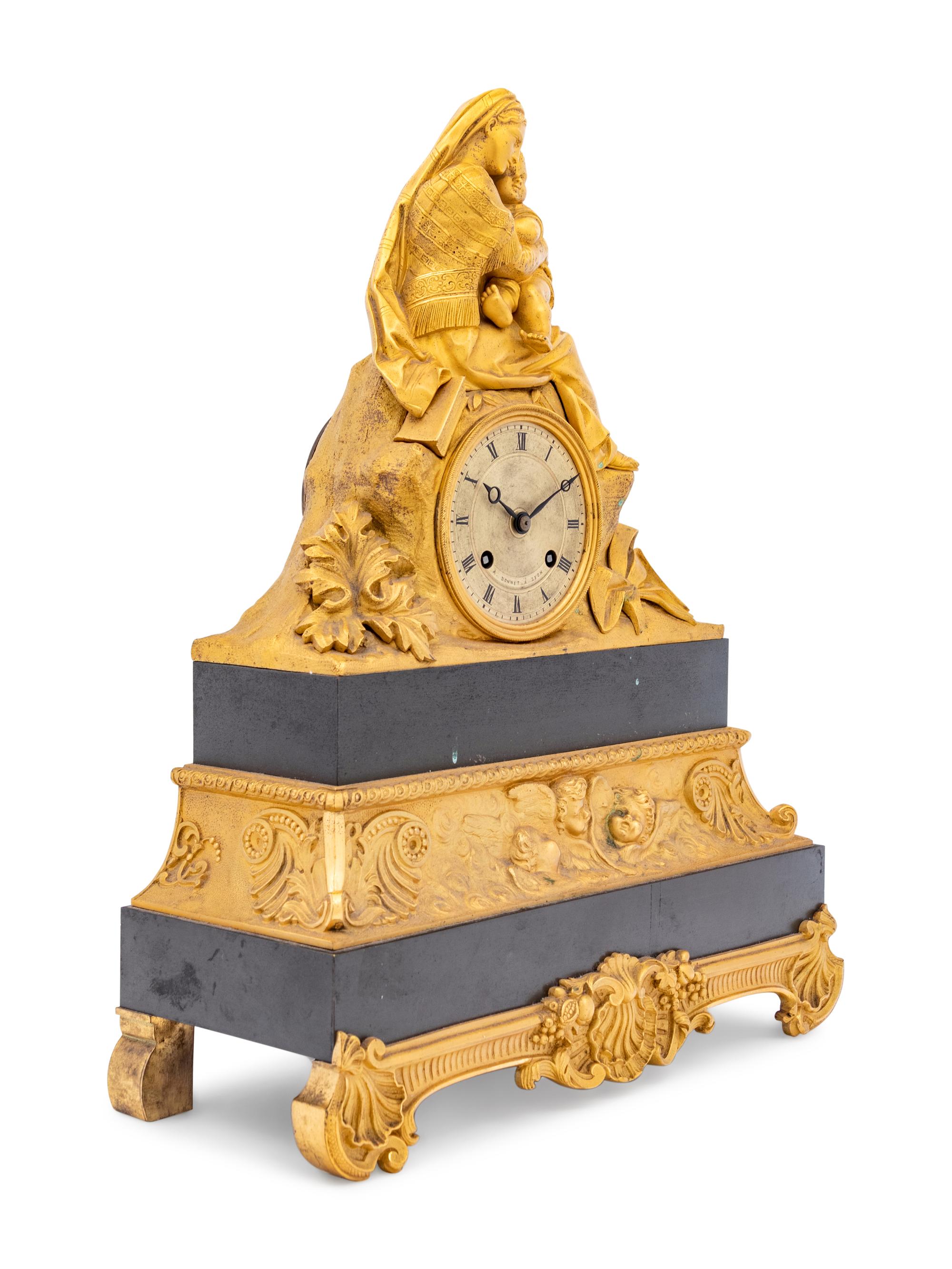 A Napoleon III Style Gilt Metal Figural Mantel Clock
