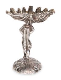 A Garrard & Co Silvered Figural Standing Salt and an Asprey Silver Bonnie Doon Commemorative Ashtray