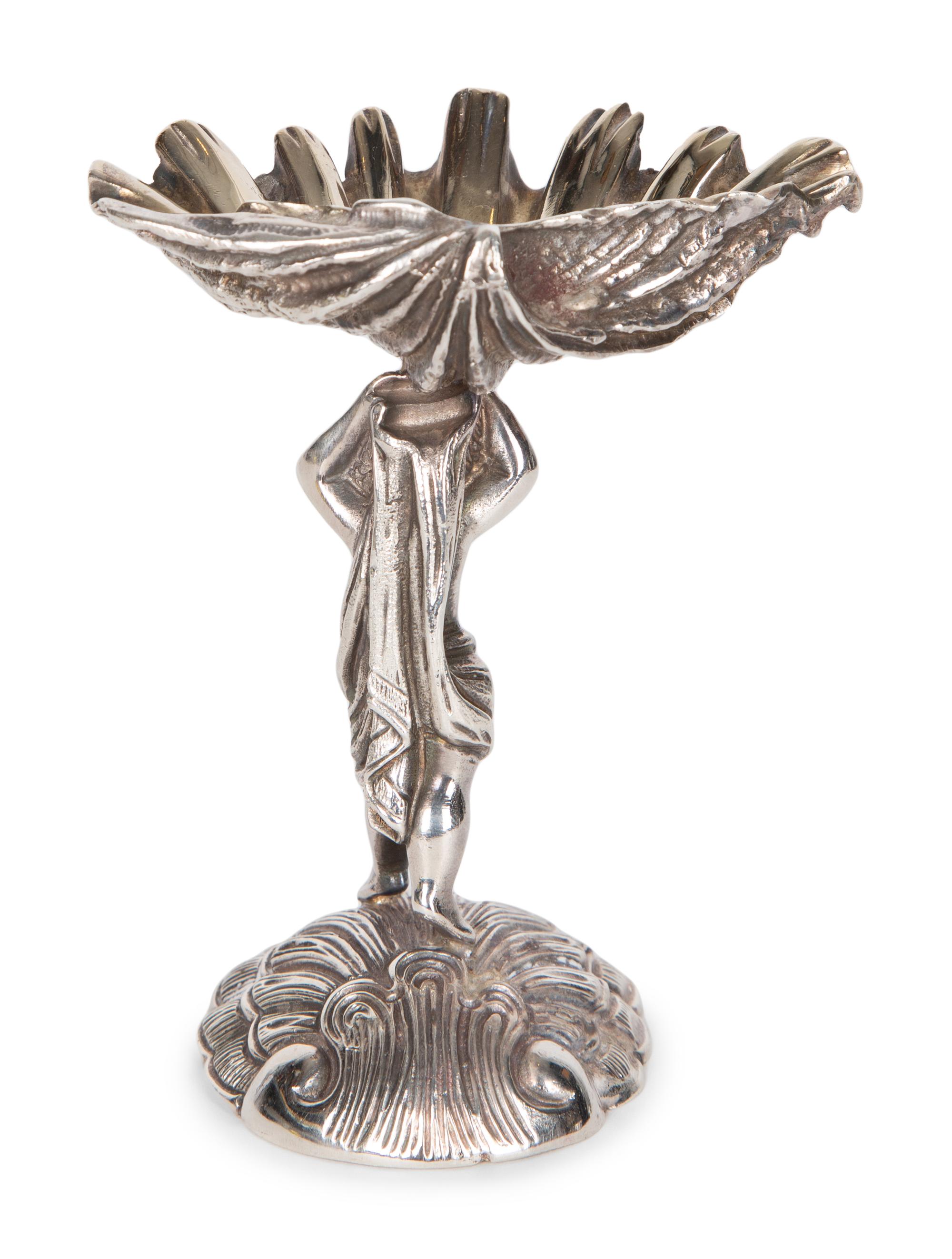 A Garrard & Co Silvered Figural Standing Salt and an Asprey Silver Bonnie Doon Commemorative Ashtray