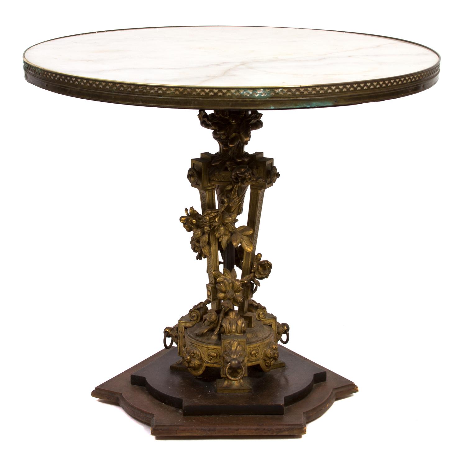 A Louis XVI Gilt Bronze Table Height 27 x diameter 30 1/4 inches. — 19TH CENTURY