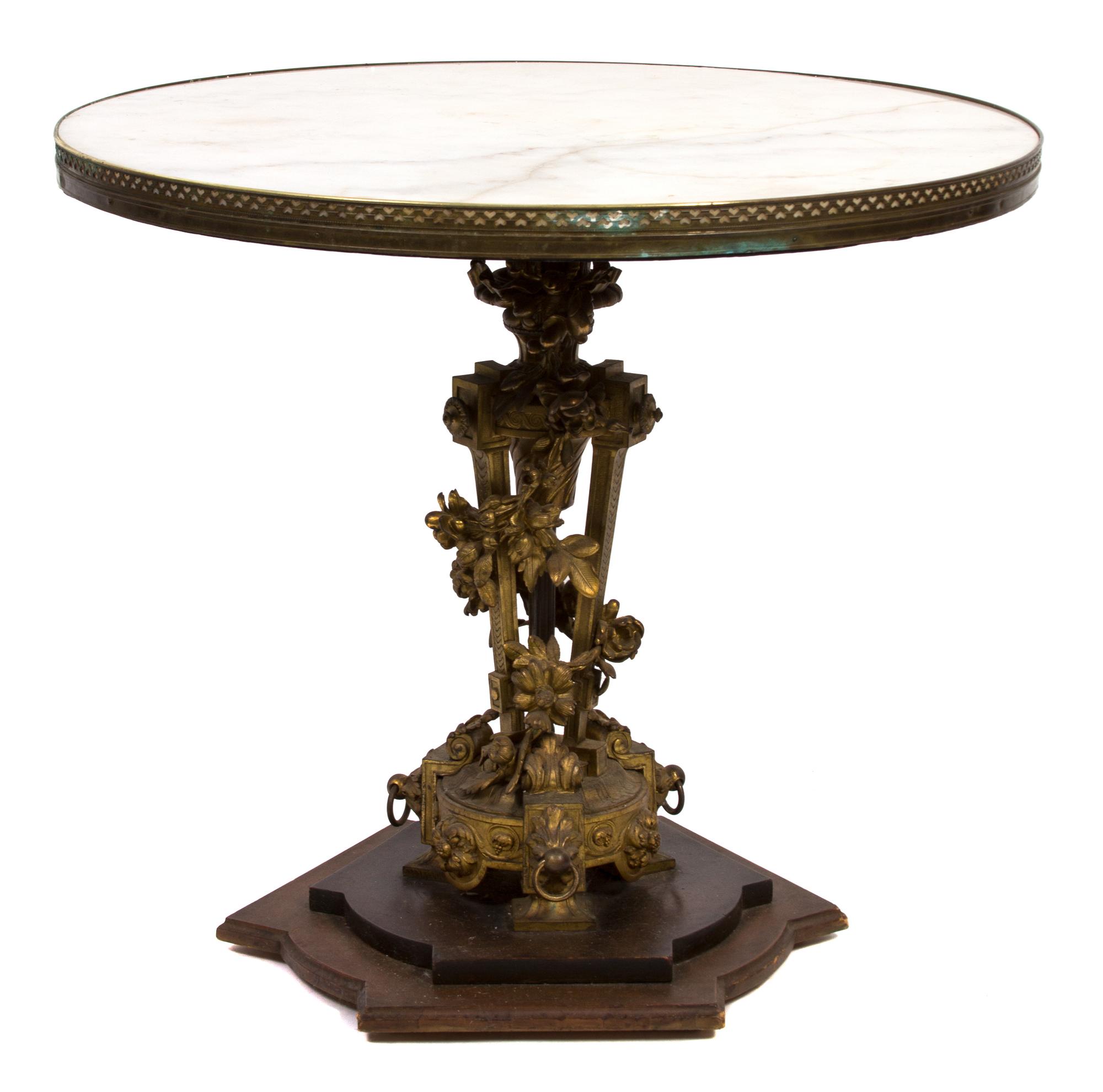 A Louis XVI Gilt Bronze Table Height 27 x diameter 30 1/4 inches. — 19TH CENTURY