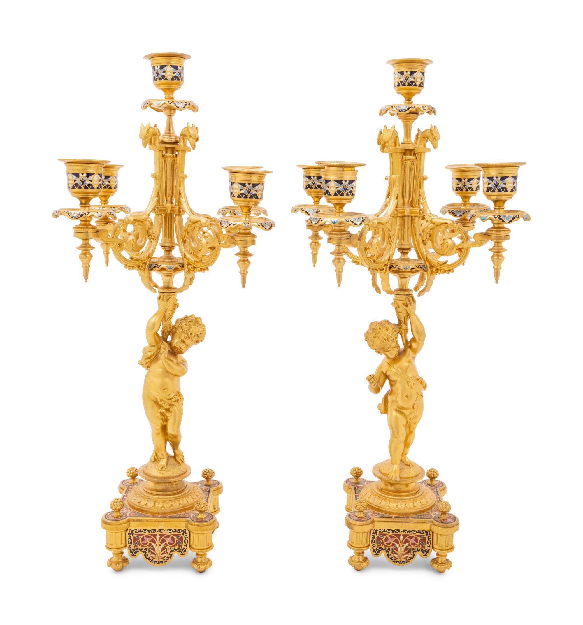 A Pair of French Gilt Bronze and Champlevé Five-Light Candelabra