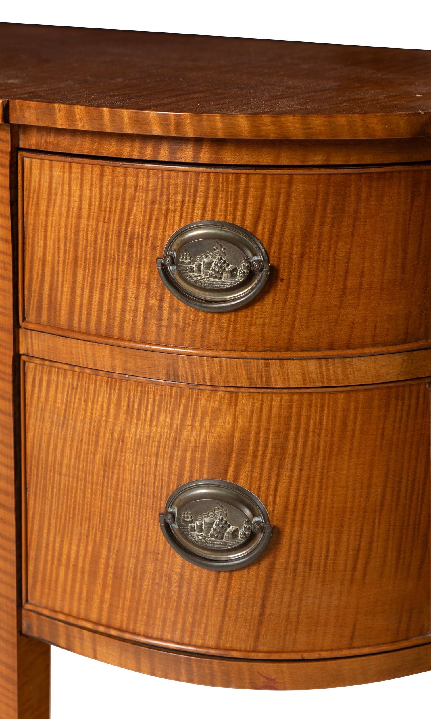 A Federal Style Tiger Maple Bowfront Sideboard