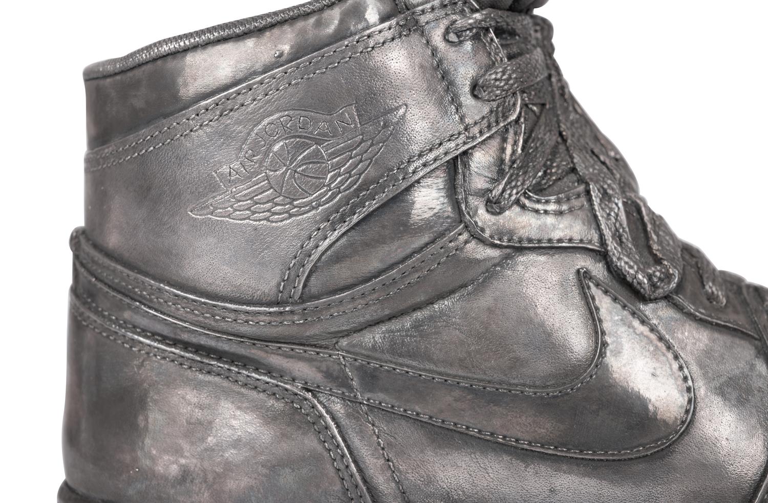 A Nike Air Jordan 1 Silver Cast Basketball Shoe Crafted for Michael Jordan's 32nd Birthday