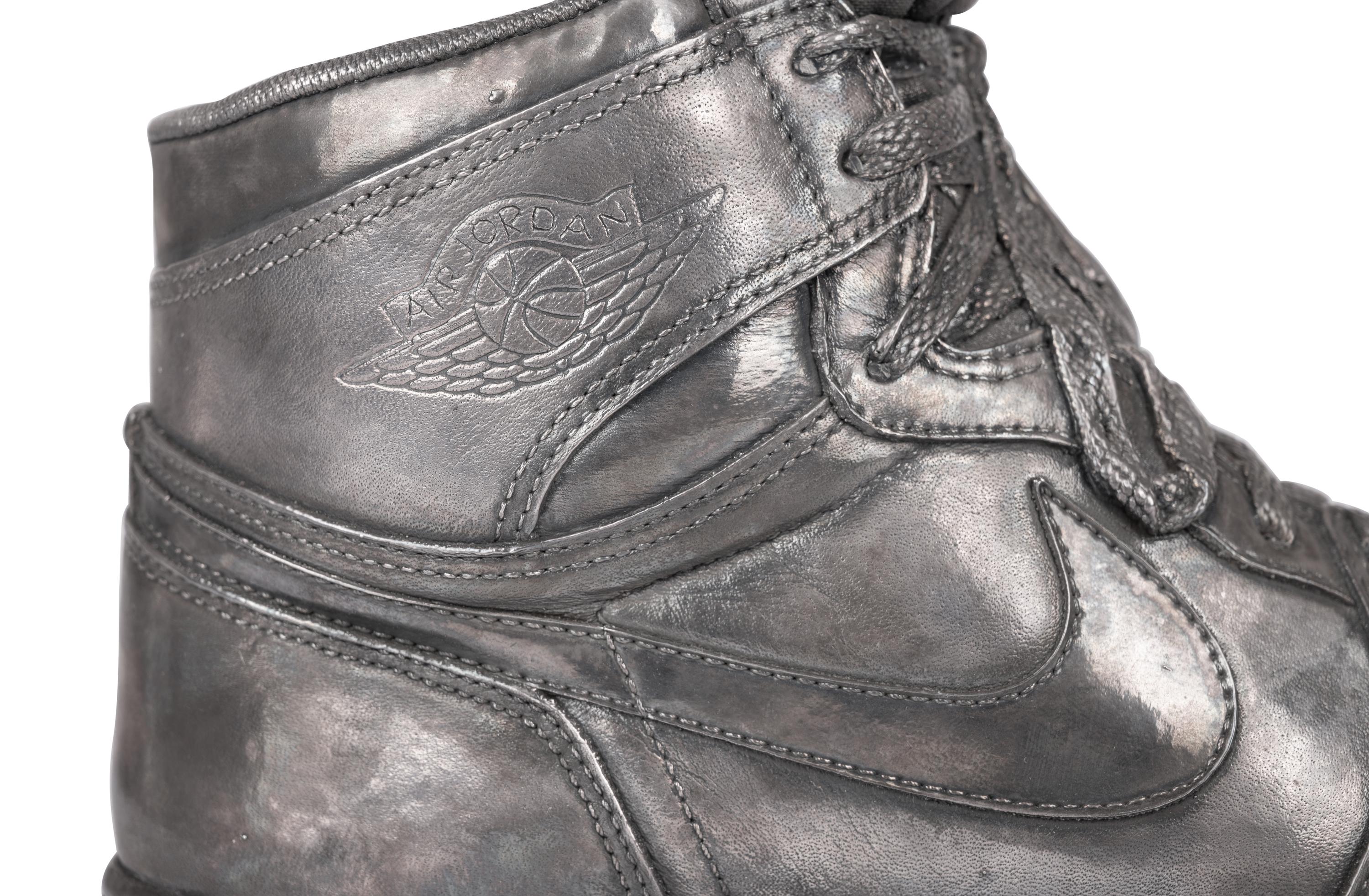 A Nike Air Jordan 1 Silver Cast Basketball Shoe Crafted for Michael Jordan's 32nd Birthday