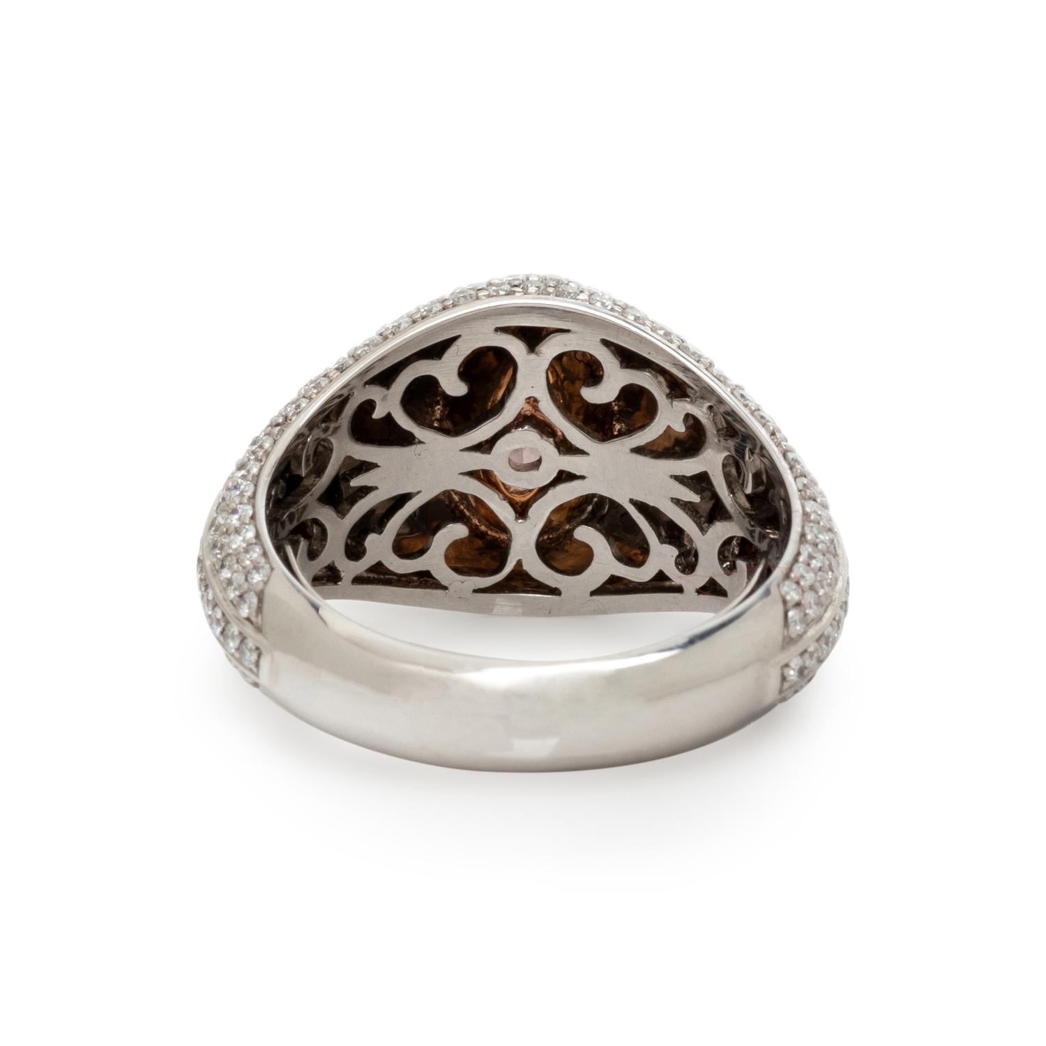 FANCY INTENSE ORANGY PINK DIAMOND AND DIAMOND RING