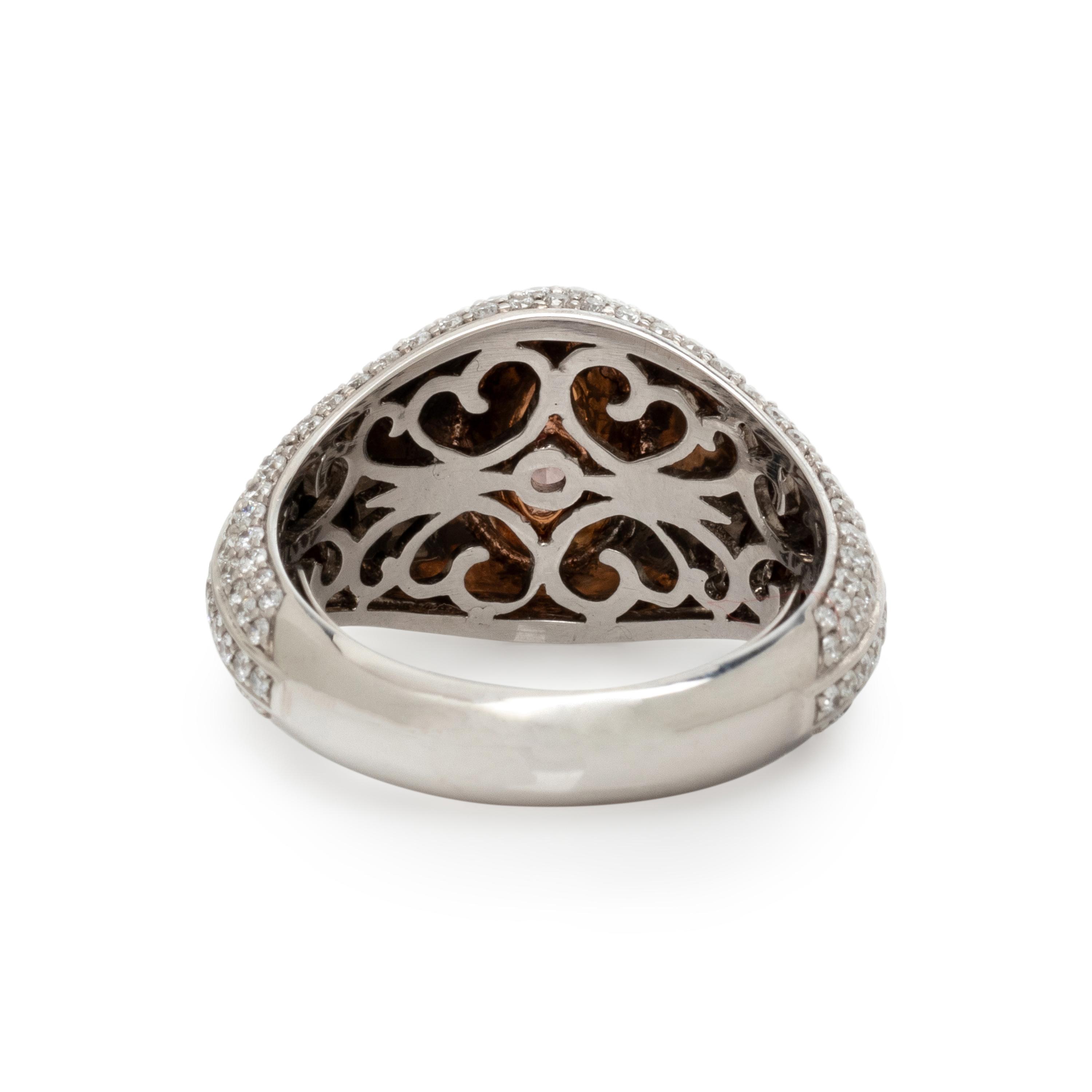 FANCY INTENSE ORANGY PINK DIAMOND AND DIAMOND RING