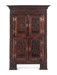 A French Carved Walnut Cabinet